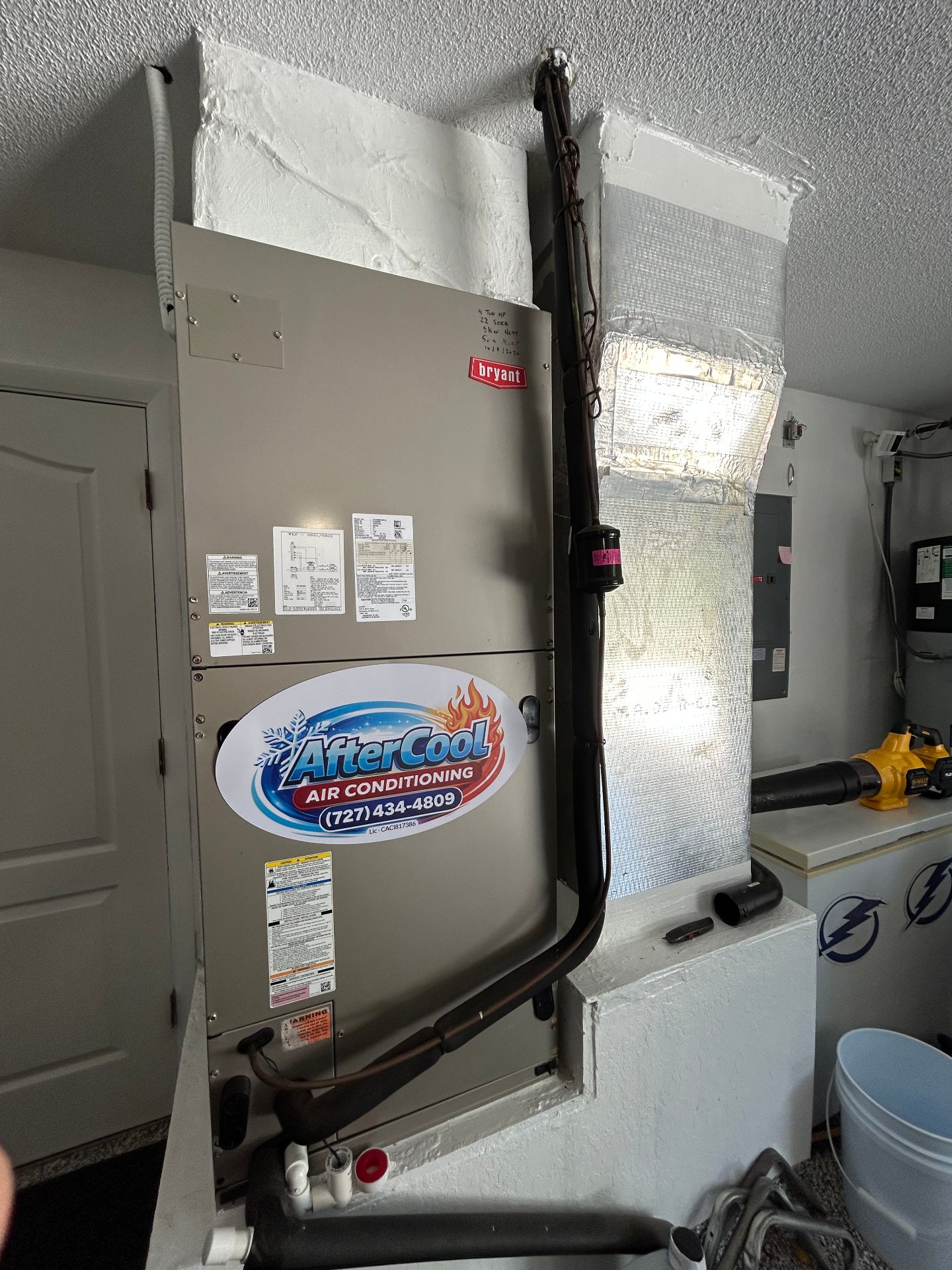 Bryant air handler installed by After Cool Air Conditioning with branded company decal